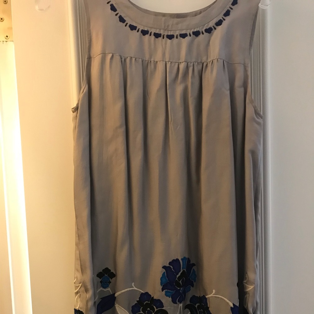 Beautiful dress with floral stitching.